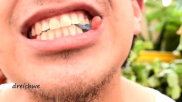 Eating worm gummies in my garden