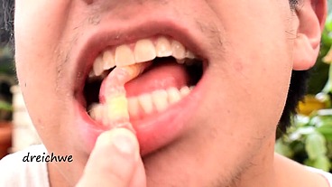 Eating worm gummies in my garden