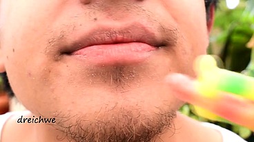 Eating worm gummies in my garden