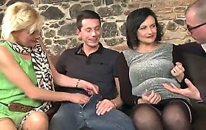 Three mature girls in a group sex session