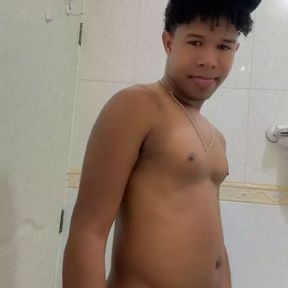 Twink undresses before shower