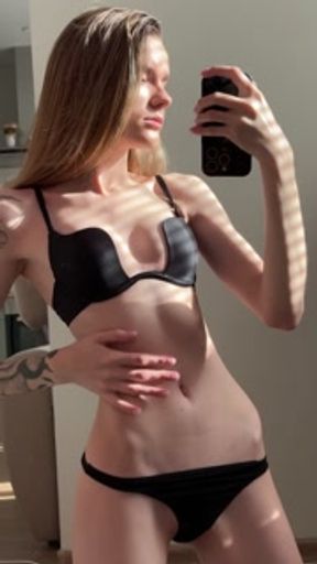 Skinny bitch shows her sexy body to daddy