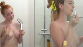 Redhead babe seduced her roomie while they were naked in a bathroom