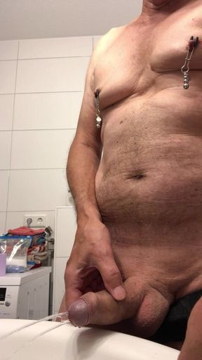 Tits with Nipple Clamps - Pissing in a Double Jet