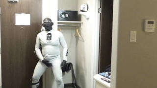 at motel window and door I jizz dressed in bastard wetsuit, silicone spandex hood