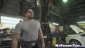 Dominant car mechanic subdues handsome hunk for feet worship