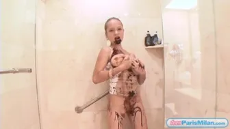Paris Milan teases with chocolate covered big tits in the shower