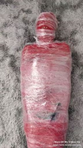 NANA Mummified with red plastic tape and then played with for orgasms