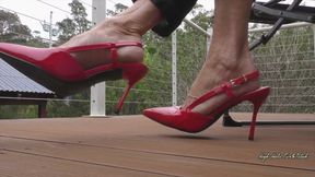 Toe and Heel Tapping in Red High Heel Slingbacks on Wooden Floor