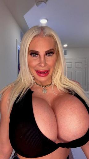 Stripping out of my sexy black underboob top and jeans