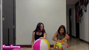 Akina and Owllete blow up and pops 2 beach balls