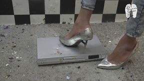 DVD Player under merciless metal Heels