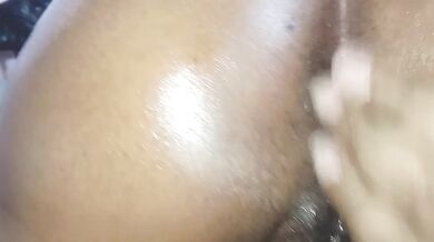 Spreading her gaping pussy open for African tongue