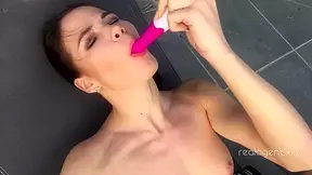 Hor Brunette Darling Lovenia Lux Is Rubbing Her Muff with Fingers and Sex Toy Poolside