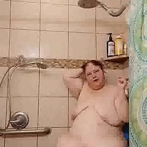 Mature Milf red head cleans her stinky sweaty body