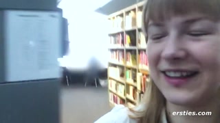 German girls enjoy themselves in a library in Berlin