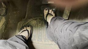 Driving dirty truck in flip flops