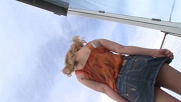 A sexy blonde with big boobs, wearing some provocative lingerie, gets down for some...