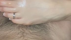 Oiled Barefoot Footjob While Watching TV