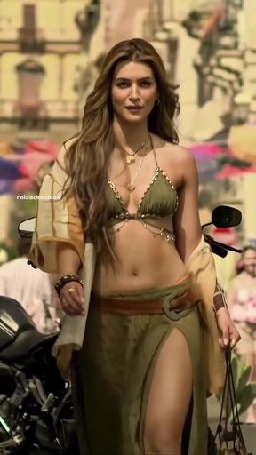 Celebrity whore gets slutty in public bikini during bollywood scene