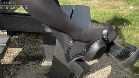 Shoeplay at the park wearing chunky heels and black tights