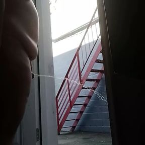 Mofo2121 pissing  out the back door