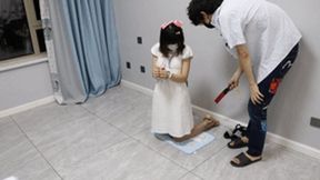 GG58 - A short-haired, barefoot girl in sandals is bound by shackles and shackles.