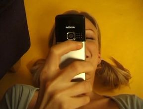 Small titted blonde rubs her wet clit