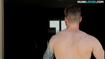 Tattooed jock rides dildo during jerkoff in solo action