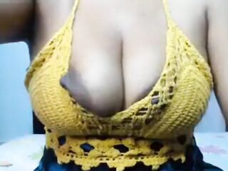 Aged giant boobs with large brown nipps areolas, close-up