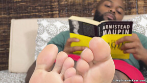 Ebony jock Dallas shows off his size 12 feet in dirty socks