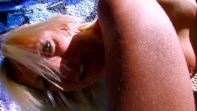 Spectacular milf is sucking dude's dong outdoors