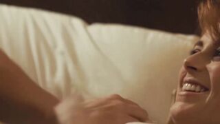 Redhead Penny Pax sat on the smooth face of Sovereign Syre in a wild tribbing session