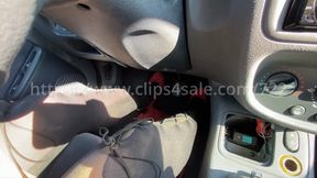 Laetitia revs drives with tights and red pumps - both pov