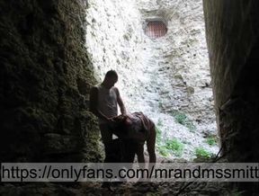 Russian brunette publicly sucks a stranger in a fortress and gets her pussy fucked