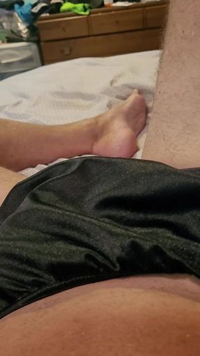 Masterbating in black nylon panties.