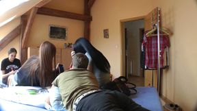Five girls with their friend at home getting playful