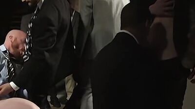 Bald man is wanking off while giving blowjobs to his colleagues