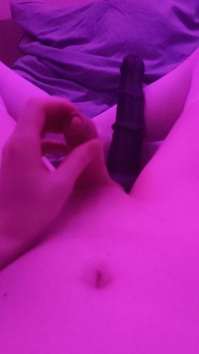 Short massage with big dildo in the background