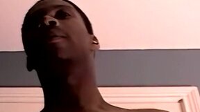 Cute young black amateur strokes his big cock and cums