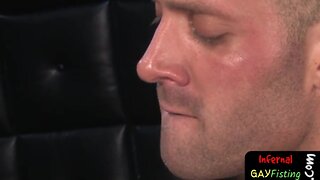 Bent over hunk gets his hole fisted