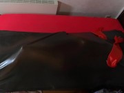Rubberdoll get in Vacbed with gloves