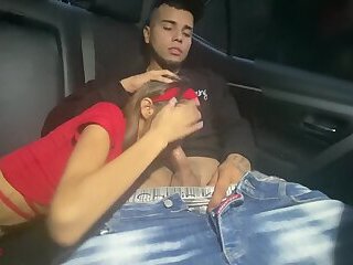 Horny stepsister gives me a blowjob in the car while we go with our parents