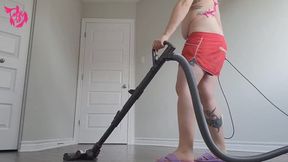 Giantess in shorts and bikini vacuums and mops while you hide in a corner