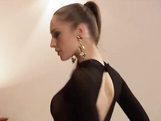 Alexandra Stein Wears a Sheer Catsuit for a Fleshly Striptease