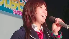 Tempting Japanese teen with red lips is giving a seductive show.