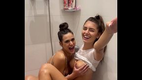 Two teen brunettes give sloppy double BJ with huge facials in shower POV