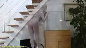 Spandex cutie squeezed in a glass box