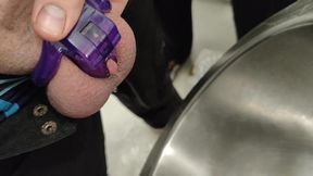 Peeing in public toilet wearing chastity with help from my girlfriend