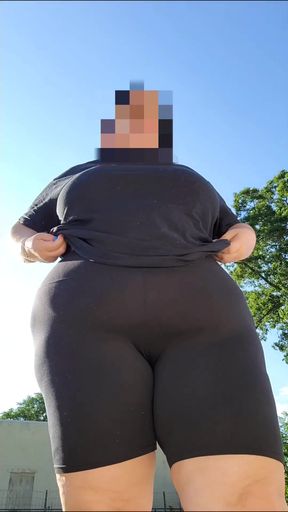 Woman in black shorts
